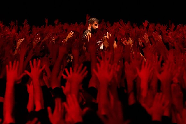 Iranian Shiite Muslims mourn in a ceremony in Tehran Iran, on Saturday, July 5, 2025, on the eve of Ashoura, the death anniversary of Prophet Muhammad's grandson, Hussein, who was killed with his 72 companions in a 7th-century battle in Karbala in present-day Iraq. (Photo by Vahid Salemi/AP Photo)