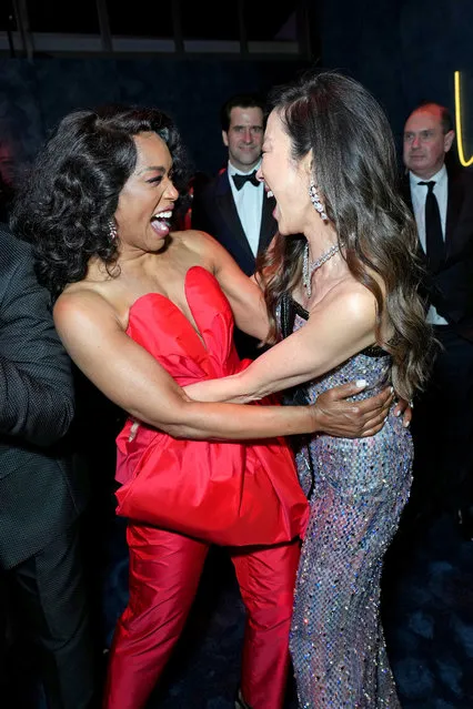 (L-R) American actress Angela Bassett and Malaysian actress Michelle Yeoh attend the 2023 Vanity Fair Oscar Party Hosted By Radhika Jones at Wallis Annenberg Center for the Performing Arts on March 12, 2023 in Beverly Hills, California. (Photo by Kevin Mazur/VF23/WireImage for Vanity Fair)