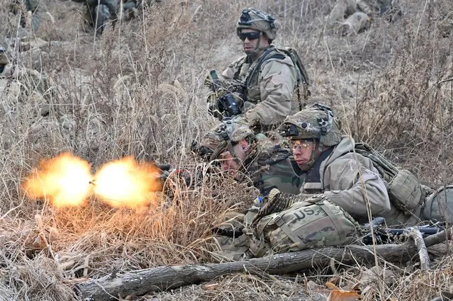 US soldiers participate in a South Korea-US joint drill at a military training field in the border city of Paju on March 16, 2023, as part of the Freedom Shield joint military exercise. South Korea and the United States kicked off the Freedom Shield joint military exercise, their largest drills in five years, which will run for 10 days from March 13, 2023 as part of the allies drive to counter North Korea's growing threats. (Photo by Jung Yeon-je/AFP Photo)