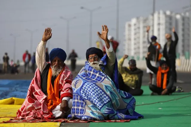 Farmers take part in a protest against the newly passed farm laws at Delhi-Uttar Pradesh border on the outskirts of Delhi, India, December 17, 2020. (Photo by Anushree Fadnavis/Reuters)