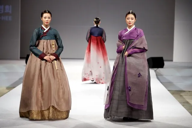 Models walk down the catwalk during the South Korean Traditional Costume “HanBok” fashion show at Gyeongbok Palace on October 22, 2016 in Seoul, South Korea. (Photo by Chung Sung-Jun/Getty Images)