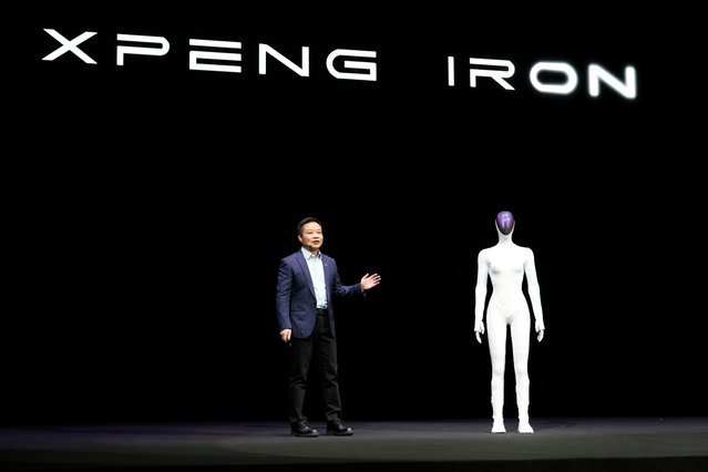 He Xiaopeng, Chairman and CEO of XPENG unveils the next generation IRON robot during the XPENG AI Day held at the company headquarters in Guangzhou in southern China's Guangdong province, Wednesday, November 5, 2025. (Photo by Ng Han Guan/AP Photo)