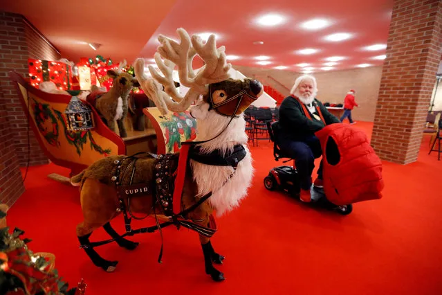 Santa Paul Fanning of Tyler, Texas rides past Christmas decorations during a break in schedule at the Charles W. Howard Santa Claus School in Midland, Michigan, U.S. October 27, 2016. (Photo by Christinne Muschi/Reuters)