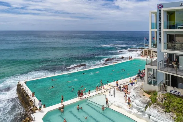 World's Greatest Swimming Pools: Iceberg Pool on Bondi Beach in Sydney, Australia. With a swimming club that first opened in 1929, the public pool and sauna along the Pacific have since become Bondi Beach staples for locals and visitors alike. Log your laps in this saltwater amphitheater – waves often crash over the side! – then cap off your visit with a meal (and spectacular balcony views) at the Icebergs Club Bistro. (From $3.71 per kid and $5.19 per adult for pool and sauna entry). (Photo by Gordon Bell/Alamy Stock Photo)