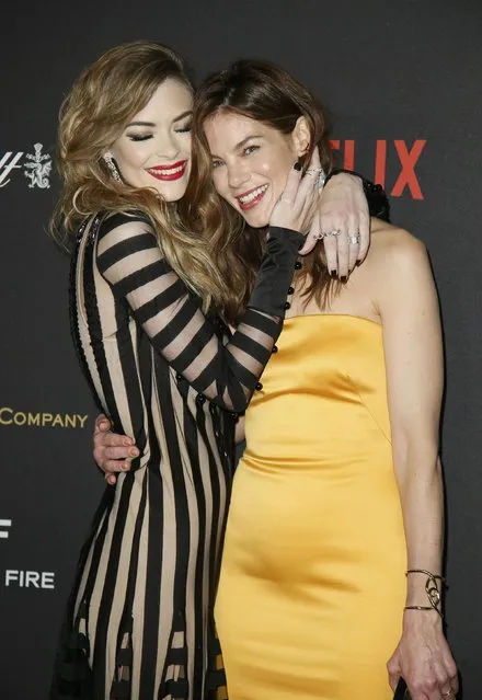 Actress Jaime King (L) greets actress Michelle Monaghan as they arrive at The Weinstein Company & Netflix Golden Globe After Party in Beverly Hills, California January 10, 2016. (Photo by Danny Moloshok/Reuters)
