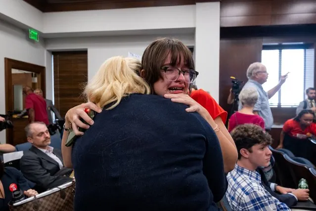 People cry during a House Civil Justice Committee where bill HB7086 advanced on the third day of special session on public safety to discuss gun violence in the wake of the Covenant School shooting, in Nashville, Tennessee, U.S., August 23, 2023. (Photo by Seth Herald/Reuters)