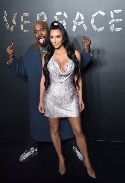 Kanye West and Kim Kardashian West attend the the Versace fall 2019 fashion show at the American Stock Exchange Building in lower Manhattan on December 02, 2018 in New York City. (Photo by Stephen Lovekin/WWD/Rex Features/Shutterstock)