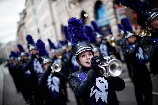 Participants take part in the annual New Year's Day Parade in central London, on January 1, 2019. (Photo by Tolga Akmen/AFP Photo)
