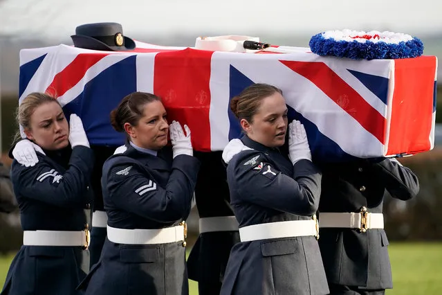 Royal Air Force pall bearers from RAF Cosford carry the coffin of World War II veteran Edna Barnett during her funeral service at Telford Crematorium on January 22, 2019 in Telford, England. The service for Edna, aged 91, took place alongside her husband Victor, 101, also an RAF veteran and Dambusters engineer took place alongside his wife Edna, 91, a member of the Women’s Auxiliary Air Force. The couple from Telford, Shropshire died within days of each other and had no surviving relatives to come to their funeral. An “call to arms” by airmen at RAF Cosford saw hundreds of people arrive to pay their respects to the couple. (Photo by Christopher Furlong/Getty Images)