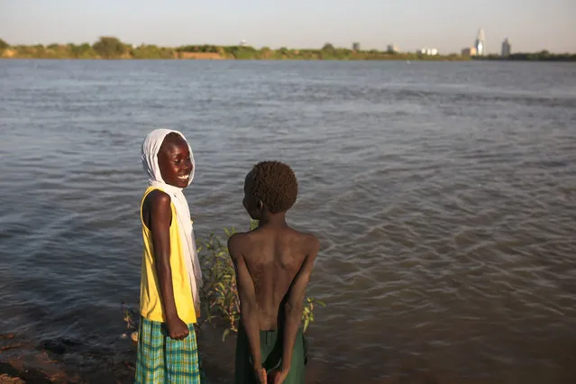 In this  Tuesday, April 14, 2015 photo, Sudanese children play on the Nile River bank, in Khartoum, Sudan. (Photo by Mosa'ab Elshamy/AP Photo)