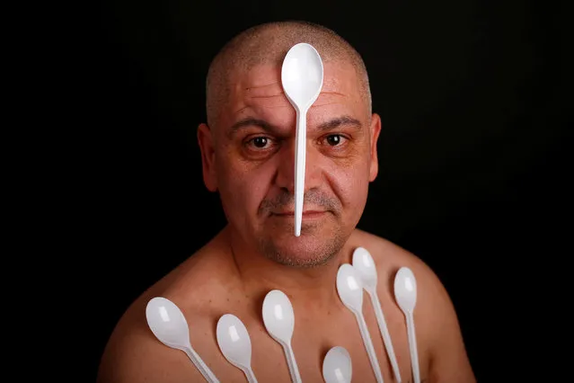 Nermin Halilagic, 38, poses with kitchen utensils in Bihac, Bosnia and Herzegovina, January 23, 2017. (Photo by Dado Ruvic/Reuters)