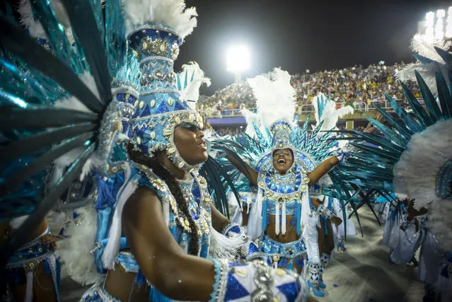 Performers dance during Beija Flor performance at the Rio de Janeiro Carnival at Sambodromo on March 3, 2019 in Rio de Janeiro, Brazil. (Photo by Raphael Dias/Getty Images)