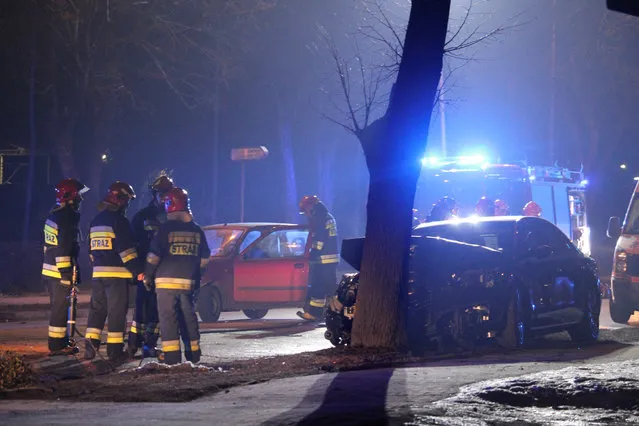 Firefighter officers inspect a site and Polish Prime Minister's Beata Szydlo's car after an accident in Oswiecim, Poland after car accident in Oswiecim, Poland February 10, 2017. (Photo by Reuters/Forum)