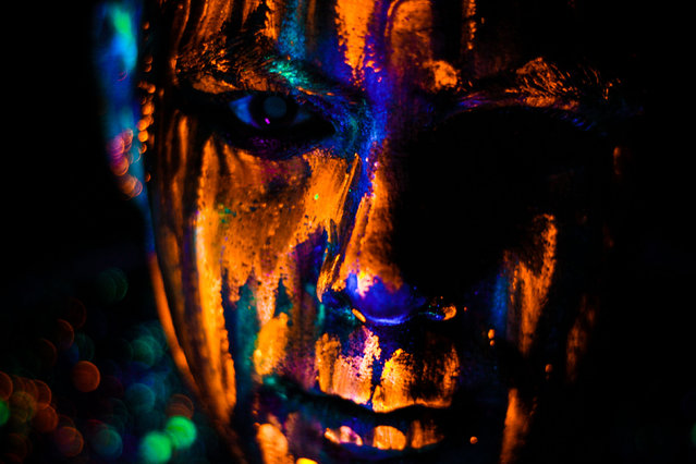 A model wearing the neon make up. (Photo by Hid Saib Neto/Caters News)