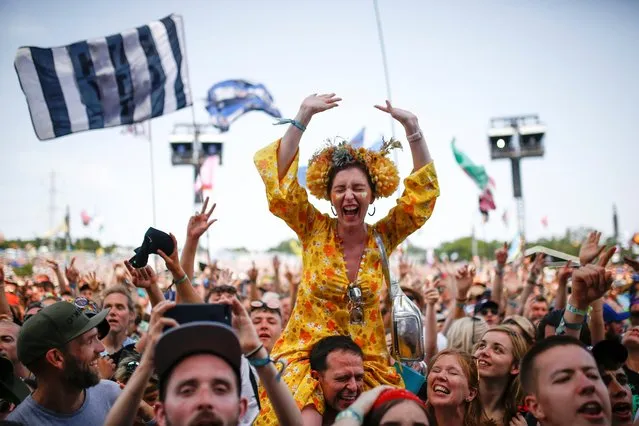 Festival goers watch the band Bastille perform on the Pyramid stage during Glastonbury Festival in Somerset, Britain June 28, 2019. (Photo by Henry Nicholls/Reuters)
