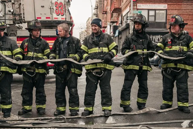 Emergency first responders remain at the scene after an intense fire at a 19-story residential building that erupted in the morning on January 9, 2022 in the Bronx borough of New York City. Reports indicate over 50 people were injured. (Photo by Scott Heins/Getty Images)