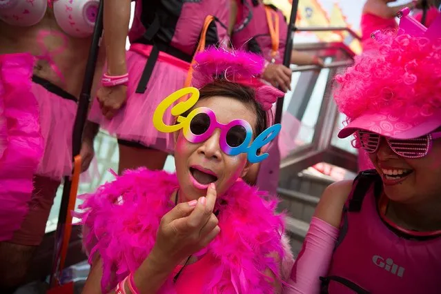 A dragon boat racer prepares for a fancy dress race on July 5, 2015 in Hong Kong, Hong Kong. (Photo by Taylor Weidman/Getty Images for Hong Kong Images)