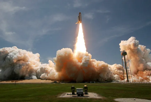 The space shuttle Atlantis lifts off from launch pad 39A at the Kennedy Space Center in Cape Canaveral, Florida May 14, 2010. (Photo by Pierre Ducharme/Reuters)