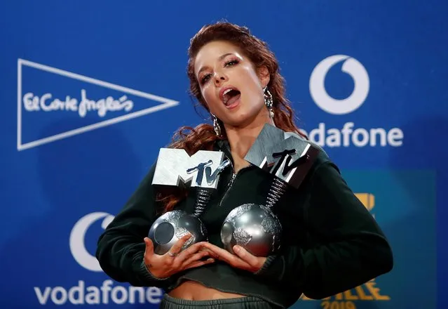 Halsey poses with the Best Pop and Best Look awards at the backstage during the 2019 MTV Europe Music Awards at the FIBES Conference and Exhibition Centre in Seville, Spain, November 3, 2019. (Photo by Jon Nazca/Reuters)