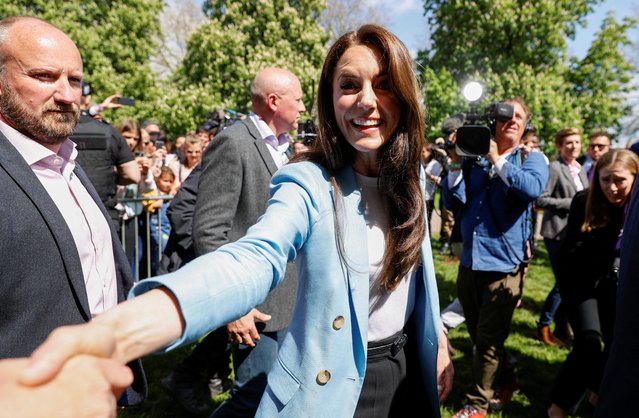 Britain's Catherine, Princess of Wales greets well-wishers along the Long Walk outside Windsor Castle, Britain on May 7, 2023. (Photo by Stephanie Lecocq/Reuters)