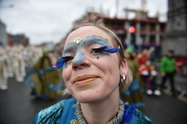 A reveller prepares for the St Patrick's Day Parade on March 17, 2023 in Dublin, Ireland. 17th March is the feast day of Saint Patrick commemorating the arrival of Christianity in Ireland. (Photo by Charles McQuillan/Getty Images)