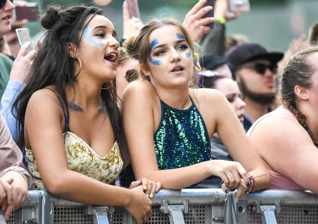 Girls in the crowd for Scouting For Girls at V Festival, Weston Park, Staffordshire, England on August 19, 2017. (Photo by Pete Summers/Rex Features/Shutterstock)