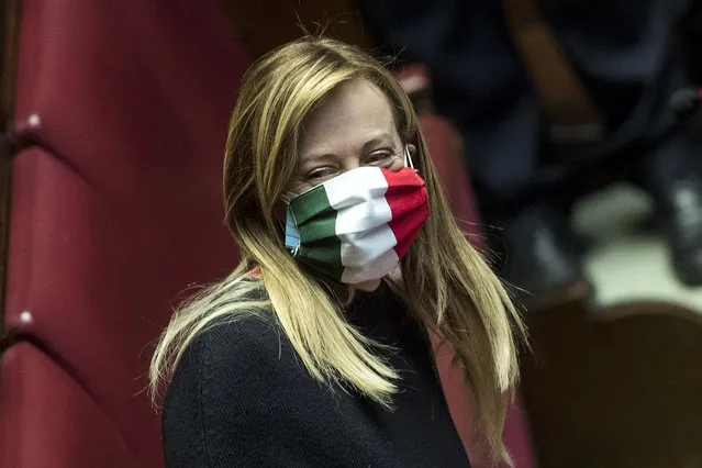 Leader of Fratelli d'Italia (Brothers of Italy) party, Giorgia Meloni, wears a mask in the colors of the Italian flag as she attends a session of the Italian Parliament in Rome, Thursday, April 16, 2020. Italy’s hardest-hit region of Lombardy is pushing to relaunch manufacturing on May 4, the day that the national lockdown is set to lift. Lombardy’s plan focuses on maintaining a one-meter distance between workers, mandating the use of masks, mobile working where possible and the use of anti-body blood testing, which is set to launch in the region on April 21, to get a better picture of where the virus is still active. (Photo by Roberto Monaldo/LaPresse via AP Photo)