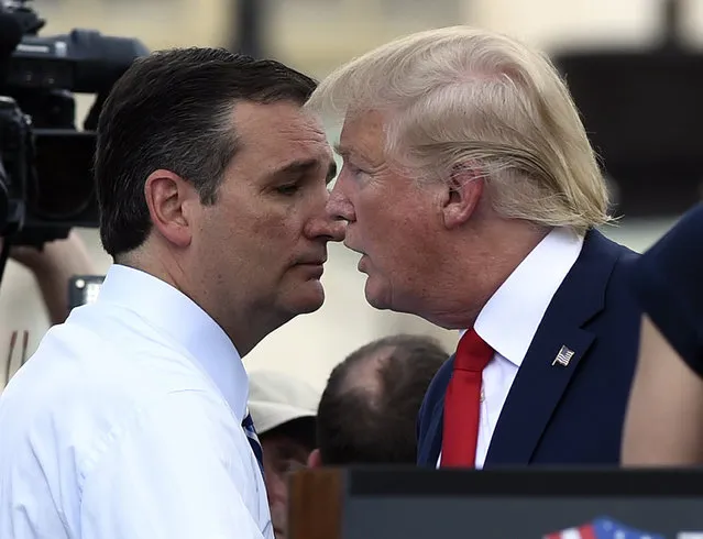 Republican Presidential candidate Donald Trump, right, speaks with fellow Republican presidential candidate Sen. Ted Cruz, R-Texas, during a rally opposing the Iran nuclear deal outside the Capitol in Washington, Wednesday, September 9, 2015. (Photo by Susan Walsh/AP Photo)
