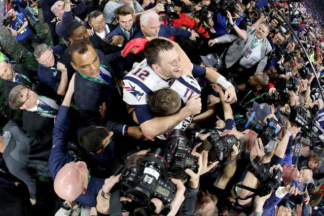 Celebration: bronze. Tom Brady and Julian Edelman celebrate the New England Patriots’ 13-3 win over the Los Angeles Rams in Super Bowl LIII in Atlanta. (Photo by Al Bello/Getty Images)