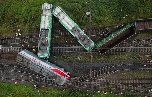 An aerial view of a scene of derailment at the Kupchinskaya railway station in Frunzensky District of St Petersburg, Russia on July 28, 2020. Two electric freight locomotives and an empty open wagon came off the rails after a tangential collsion between two freight trains. (Photo by Peter Kovalev/TASS/Sipa USA)