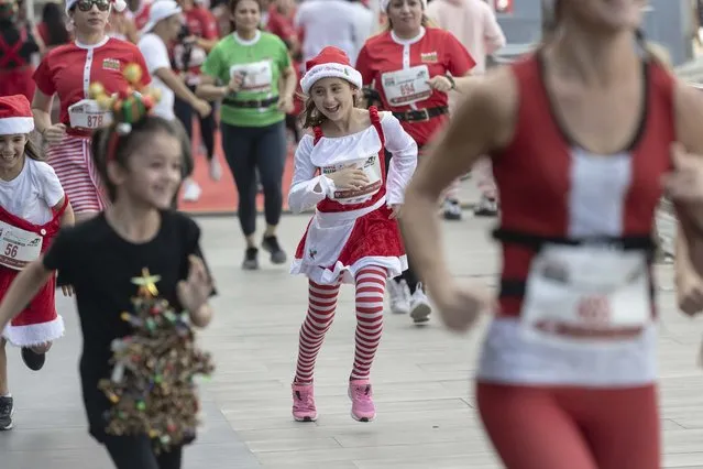 Dubai residents dressed in their festive finest and competed to find out who was the fastest at The Dubai Festival City Santa Fun Run on December 10, 2022. (Photo by Antonie Robertson/The National)