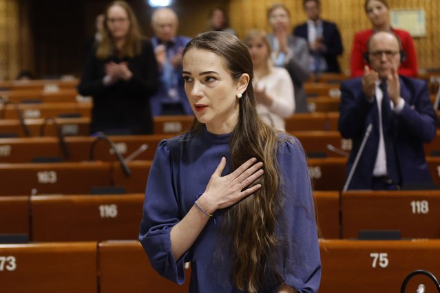 Oleksandra Matviichuk, an Ukrainian human rights lawyer, head of the Center for Civil Liberties and 2022 Nobel Peace Prize laureate, reacts as she his applauded after her speech at the Council of Europe Parliamentary Assembly (PACE) in Strasbourg, eastern France, Thursday, January 26, 2023. The Council of Europe Parliamentary Assembly is holding an urgent debate on the legal and human rights aspects of the Russian's aggression against Ukraine. (Photo by Jean-Francois Badias/AP Photo)