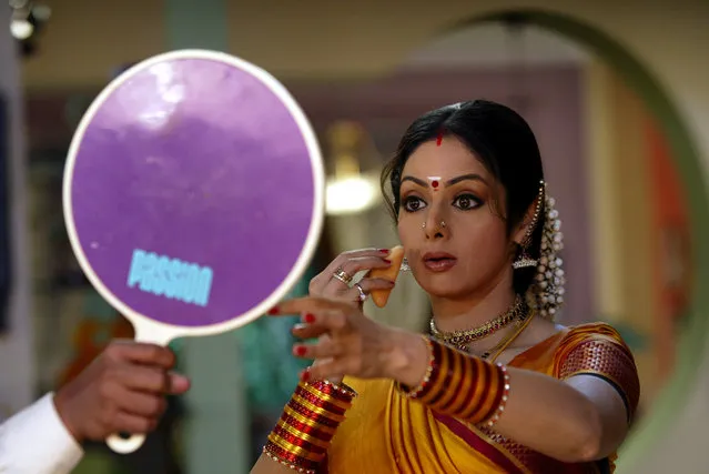 Bollywood star Sridevi checks her make-up during the making of a television serial “Malini Iyer”, in Bombay January 15, 2004. Sridevi Kapoor, Bollywood’s leading lady of the 1980s and ‘90s who redefined stardom for actresses in India, has died at age 54. The actress, known by one name, was described as the first female superstar in India’s male-dominated film industry. Her brother-in-law Sanjay Kapoor speaking to the Indian Express online confirmed she died Saturday, February 24, 2018, in Dubai due to cardiac arrest. (Photo by Sherwin Crasto/Reuters)