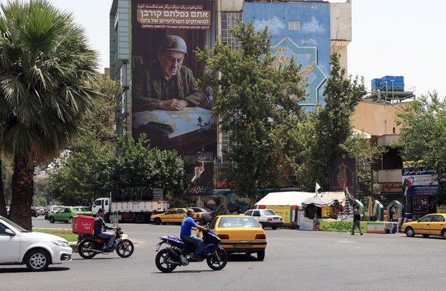 An anti-Israel billboard displaying a picture of Israel Prime Minister Benjamin Netanyahu and reading 'Netanyahu failed in another war' hangs at Palestine Square in Tehran, Iran, 08 July 2025. A US-mediated ceasefire between Iran and Israel was announced on 24 June, ending a conflict that began on 13 June after Israel conducted a campaign across Iran targeting nuclear, military, and energy facilities, prompting Iran to launch retaliatory waves of missiles and drones toward Israel. (Photo by Abedin Taherkenareh/EPA)