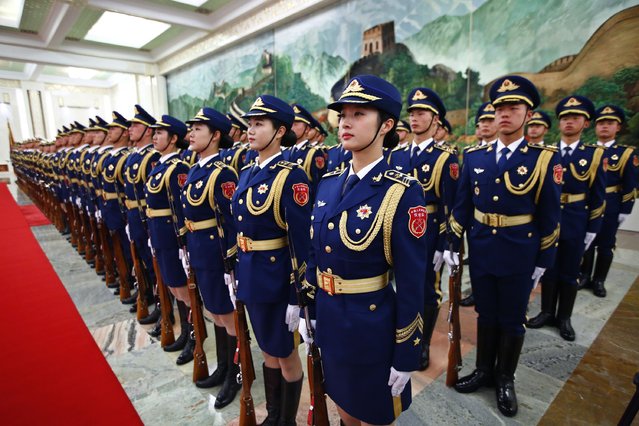 Honor guards stand during a welcoming ceremony Chinese President Xi Jinping held for South African President Jacob Zuma at the Great Hall of the People in Beijing, December 4, 2014. (Photo by Petar Kujundzic/Reuters)