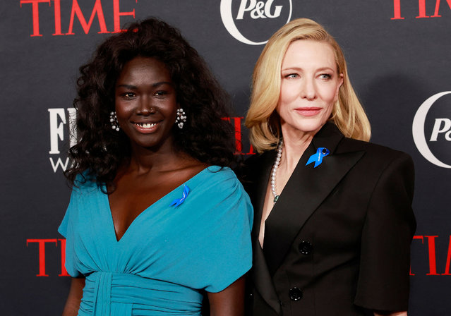 US-Australian actress Cate Blanchett (R) and United Nations High Commissioner for Refugees Goodwill Ambassador South Sudanese activist Mary Maker (L) arrive for the Time Magazine 2nd annual Women of the Year Gala in Los Angeles on March 8, 2023, International Women's Day. (Photo by Michael Tran/AFP Photo)