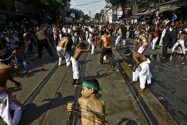 Shi'ite Muslims flagellate themselves during a Muharram procession to mark Ashura in Kolkata, India, October 24, 2015. (Photo by Rupak De Chowdhuri/Reuters)