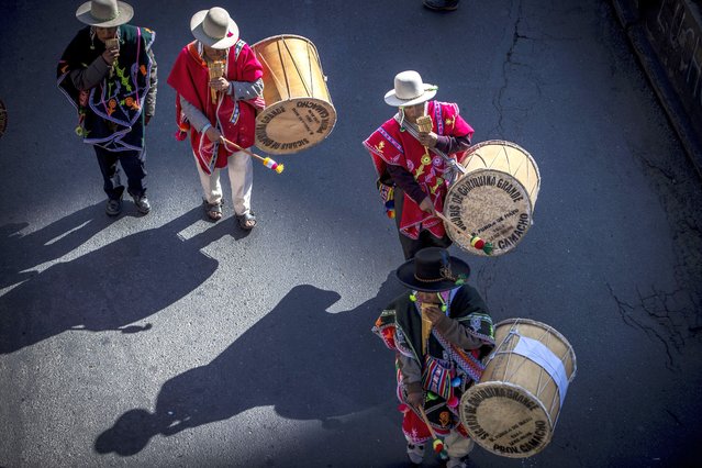Community members participate in a march in La Paz, Bolivia, 04 June 2024. Bolivia launched activities for Andean New Year 5,532, which will be mainly celebrated on 21 June in the pre-Hispanic citadel of Tiwanaku. Andean New Year is considered a time to 'recharge' energies and welcome the new agricultural cycle in the southern hemisphere. (Photo by Esteban Biba/EPA)