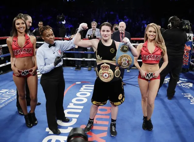 Ireland's Katie Taylor, second from right, poses for photographs after a women's lightweight championship boxing match against Argentina's Victoria Noelia Bustos, Saturday, April 28, 2018, in New York. Taylor won the fight. (Photo by Frank Franklin II/AP Photo)