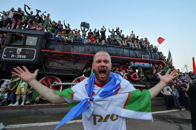 Lokomotiv Moscow’s Vitaliy Denisov reacts in front of fans after winning in the Russian Football League match between FC Lokomotiv Moscow and FC Zenit Saint Petersburg on May 5, 2018 at RZD Arena in Moscow, Russia. (Photo by Alexander Fedorov/Reuters)