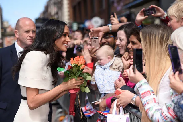 Meghan, the Duchess of Sussex, greets people during a visit to Chester, Britain June 14, 2018. (Photo by Eddie Mulholland/Reuters/Pool)