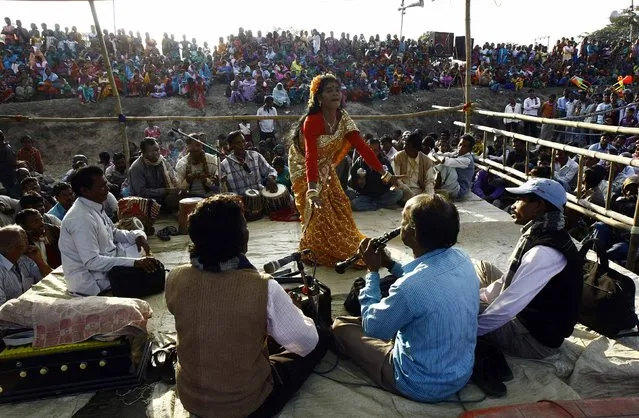 Joshna Mahato, 32, a dancer, performs during a day long village festival of Chhau at Baman Jhara village in Purulia district, in the eastern Indian state of West Bengal January 31, 2015. (Photo by Rupak De Chowdhuri/Reuters)