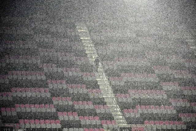 Rain is pouring on the stands ahead of the round of 32 Leagues Cup football match between Inter Miami CF and Orlando City SC at DRV PNK Stadium in Fort Lauderdale, Florida, on August 2, 2023. (Photo by Chandan Khanna/AFP Photo)