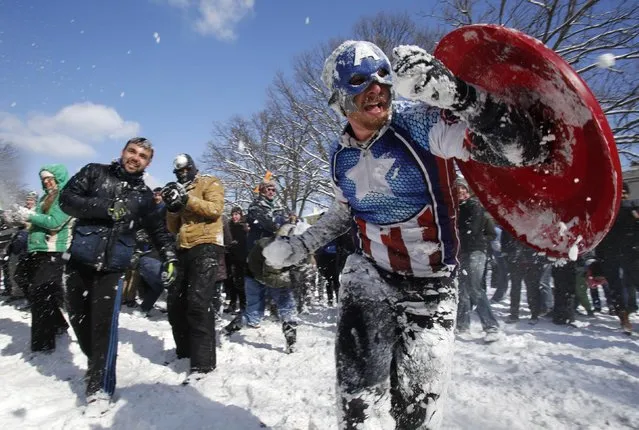 People participate in a massive snowball battle in the wake of winter storm Octavia at Meridian Park in Washington February 17, 2015. (Photo by Yuri Gripas/Reuters)