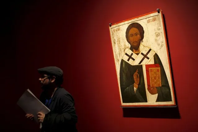 A man stands next to the icon of “St. Lazarus the friend of God” during an international press tour of the Malaga branch of the State Museum of Russian Art of St Petersburg, a day before its inauguration in Malaga, southern Spain March 24, 2015. (Photo by Jon Nazca/Reuters)