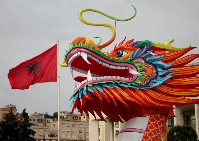 Chinese new year decoration are seen in the center square as a Chinese New Year welcoming in Tirana, Albania, 04 February 2019. Chinese artists have decorating the center square of the capital to welcome the Chinese New Year or as its known the year of the Pig. (Photo by Malton Dibra/EPA/EFE)