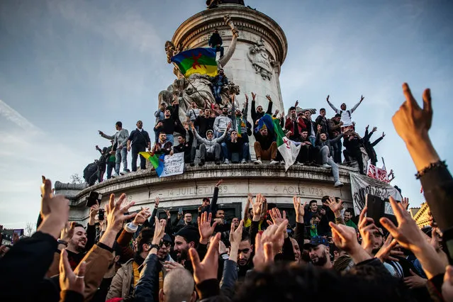 Protesters from the Franco-Algerian community gather at Republic square to protest against the fifth term of Algerian President, Abdelaziz Bouteflika in Paris, France, 24 February 2019. Abdelaziz Bouteflika, has been serving as the president since 1999, has announced on 19 February he will be running for a fifth term in presidential elections scheduled for 18 April 2019. (Photo by Christophe Petit-Tesson/EPA/EFE)