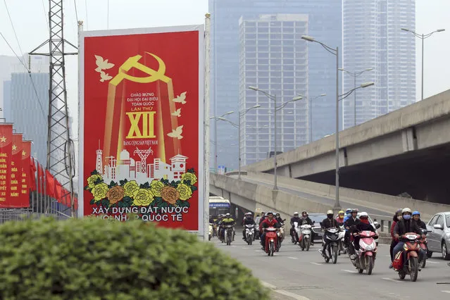 In this January 19, 2016, photo traffic ride past a Communist party poster in Hanoi, Vietnam. Vietnam's selection as the venue for the second summit between U.S. President Donald Trump and North Korean leader Kim Jong Un is largely a matter of convenience and security, but not without bigger stakes. Vietnam's history as a U.S. adversary in a long, divisive war that transitioned on its own terms to a dynamic free-market economy under a communist political system suggests a larger meaning for the summit. (Photo by Hau Dinh/AP Photo)