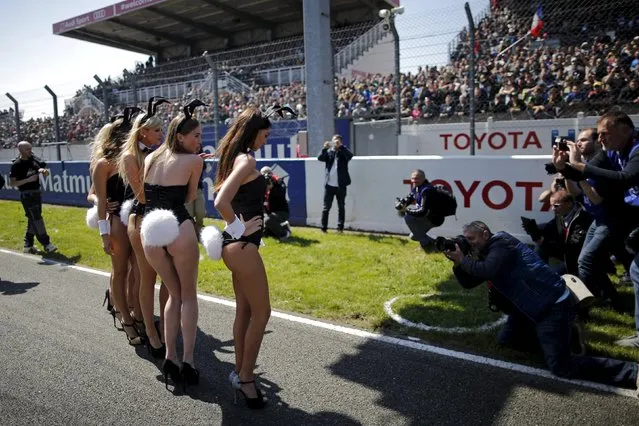 Playmate girls pose before the 38th Le Mans 24 Hours motorcycling endurance race in Le Mans, western France April 18, 2015. (Photo by Stephane Mahe/Reuters)