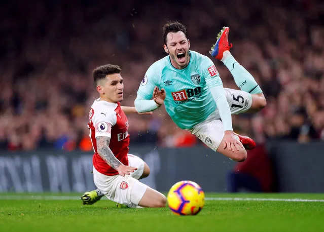 Lucas Torreira of Arsenal tackles Adam Smith of AFC Bournemouth during the Premier League match between Arsenal FC and AFC Bournemouth at Emirates Stadium on February 27, 2019 in London, United Kingdom. (Photo by Eddie Keogh/Reuters)